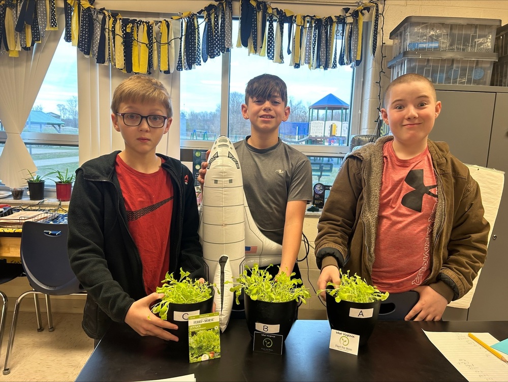 3 male 5th grade students